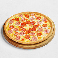 С ветчиной и помидорами большая в ПиццаФабрика