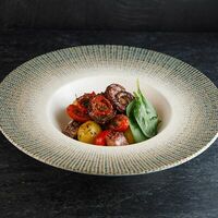 Осьминог с бейби картофелем и вялеными томатами в Neft