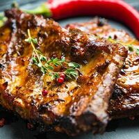 Свиные ребра на углях в Огонь и Мясо