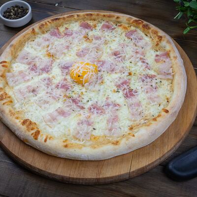 Пицца Карбонара в Luigis Pizza по цене 620 ₽