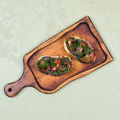 Брускетта с пастой из маслин в Пармезан и пури по цене 210 ₽