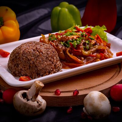 Свинина в кисло-сладком соусе в Тесоро по цене 590 ₽