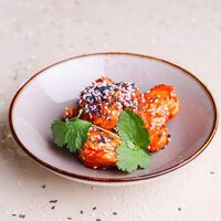 Яннём чикен в Kimchi Корейская уличная еда