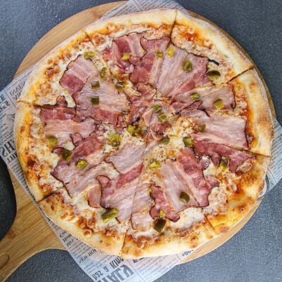Пицца с грудинкой и халапеньо в На югах по цене 810 ₽