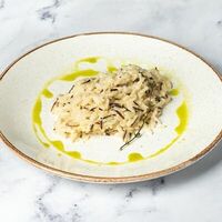 Дикий и белый рис со сливками в Перчини на огне