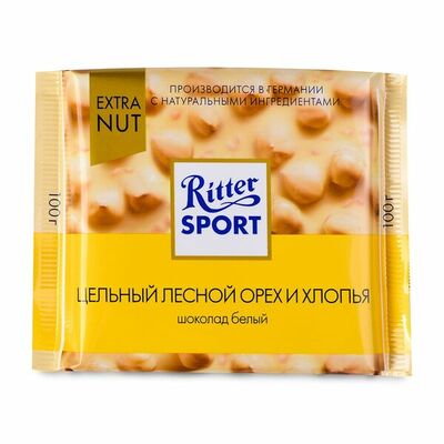 Шоколад Риттер Спорт белый с цельным лесным орехом и хлопьями в Азбука Вкуса Экспресс Меню по цене 139 ₽