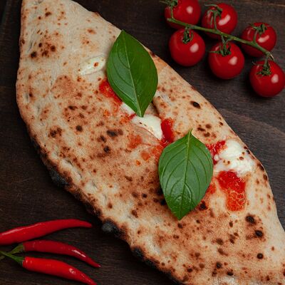 Кальцоне Пепперони в Storia Pizza по цене 750 ₽