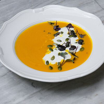 Тыквенный крем-суп, пармезанв Bisou Bisou Bistro по цене 490 ₽