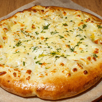 Хачапури по-имеретински в Кафе Наше Место по цене 710 ₽