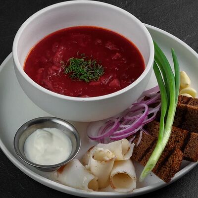 Борщ с говядинойв По Чесноку по цене 599 ₽