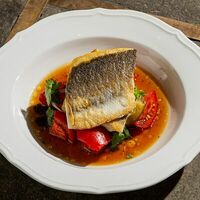 Филе сибаса с баклажанами и томатами в Lele Kitchen & Wine