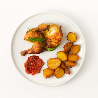 Цыпленок Тапака и молодой картофель с хмели в Saperavi Cafe по цене 749 ₽