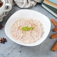 Каша Рисовая молочная с яблоком и корицей в Cofan European kitchen & Cofanori Asian bistro