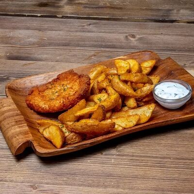 Шницель куриный с картофелем по-деревенски в Сушико по цене 489 ₽