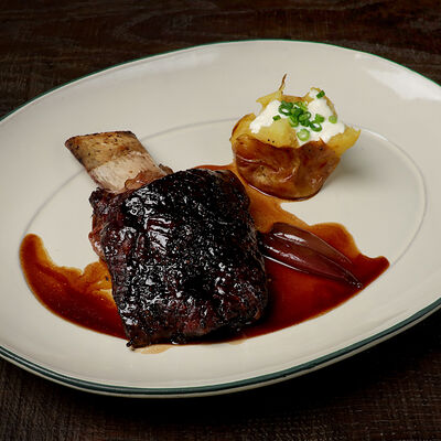 Копченое ребро, картофель в Dacha restaurant по цене 2400 ₽