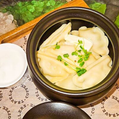 Вареники с картофелем и грибами в Travelers Coffee по цене 455 ₽