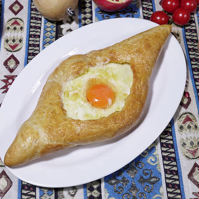 Хачапури по аджарски в Ресторан Барашек по цене 920 ₽