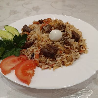 Плов в Чайхана по цене 480 ₽