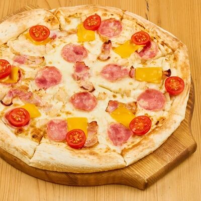 Пицца Деревенская в 4 сыра по цене 910 ₽