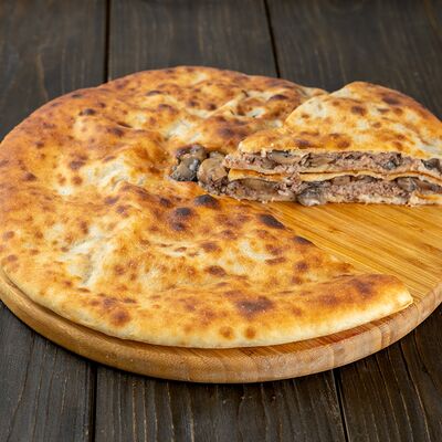 Пирог с мясом и грибами в Осетинские пироги Вкусно Пироги по цене 1100