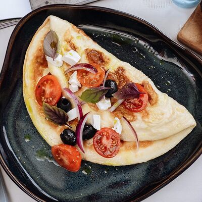 Омлет Эллада в Ойкумена по цене 400 ₽