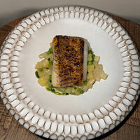 Палтус, картофель, горох, белый соус в Айна