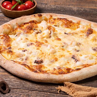 Морская пицца в Дом пиццы по цене 1235 ₽