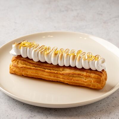 Эклер Лимонный с меренгой в Кондитерская La mousse по цене 265 ₽