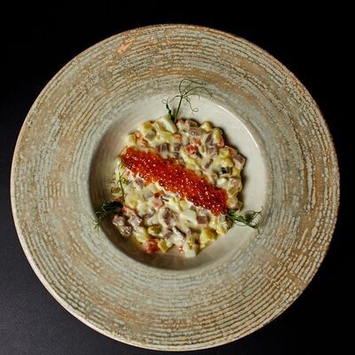 Салат Оливье с языком и красной икрой в Koster по цене 990 ₽