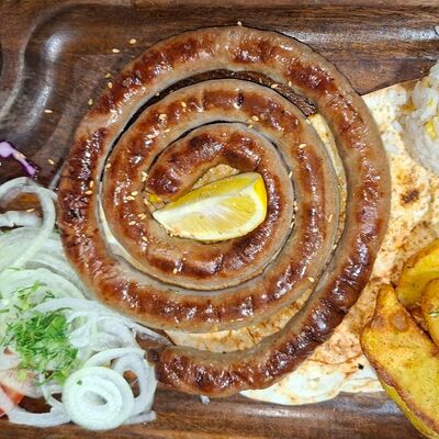 Колбаски с гарниром в Shafran по цене 80000 сум