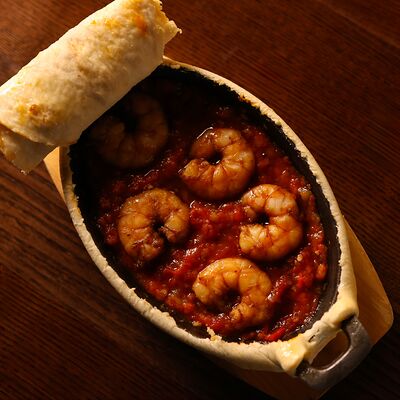 Креветки, запеченные в сковородке в Серкан по цене 990 ₽