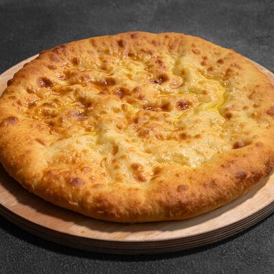 Осетинский пирог с картошкой и сыром в Ручеек по цене 975 ₽