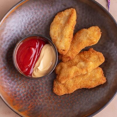 Куриные наггетсы с соусом в Мархаба Халяль по цене 360 ₽