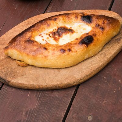 Хачапури с сыром из русской печи в Кафе-парк Теремок по цене 310 ₽