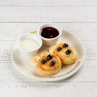 Детские сырники со сметаной в АндерСон по цене 380 ₽