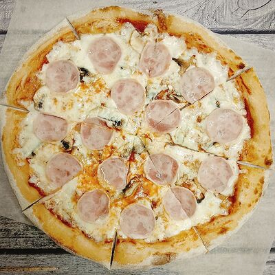 Ветчина-грибы на томатном соусе в Бонаа пицца по цене 480 ₽