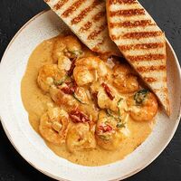 Креветки с соусом из Пармезана в Морошка