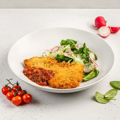 Шницель из индейки с томатной сальсой в АндерСон по цене 690 ₽