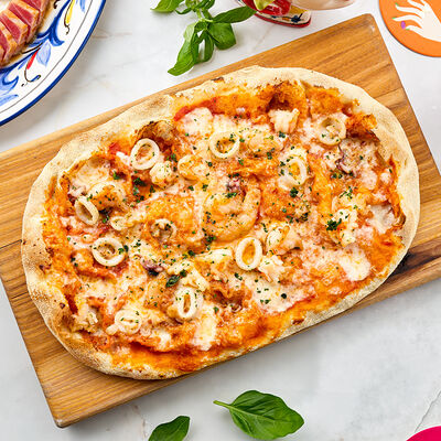 Пицца с морепродуктами classico в Osteria Dolce по цене 1100 ₽