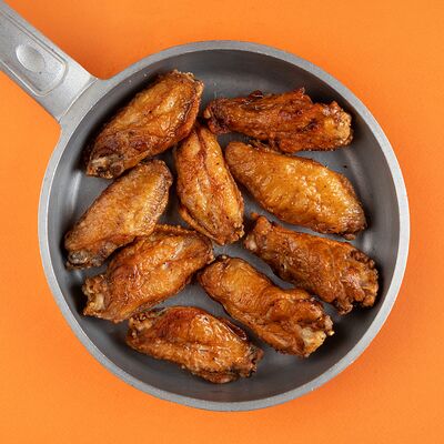 Жареные крылышки в Краснодарский парень по цене 250 ₽