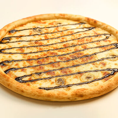 Банан в шоколаде в Apizza по цене 588 ₽