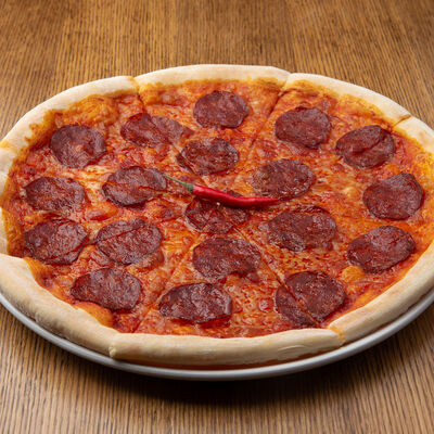 Пицца Пепперони в Помидорро по цене 575 ₽