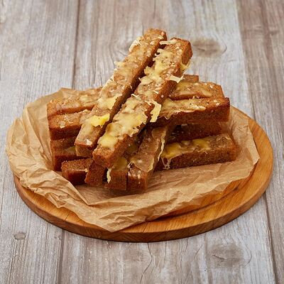 Гренки чесночные с сыром в Перчим & солим по цене 270 ₽