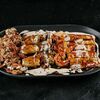 Морепродукты, запечённые в азиатском соусе в Wok café по цене 1450