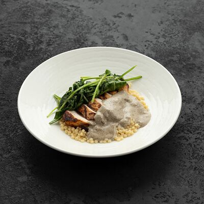 Филе индейки с птитимом, шпинатом и грибным соусом в Асъядор по цене 850 ₽