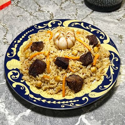 Плов с говядиной узбекский Ташкентский в Фуд Тайм Шашлык Шаурма Пицца по цене 450 ₽