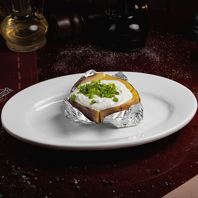 Запечённый фермерский картофель в У Гашека по цене 140 ₽