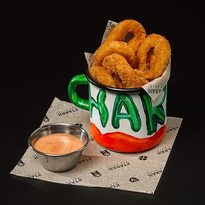 Луковые кольца в Harats Pub по цене 483 ₽