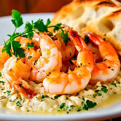 Хвосты тигровых креветок в сливочном соусе в РАКИДОНА по цене 940 ₽