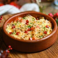 Томлёная говядина с овощами под сырной шапкой в Нино